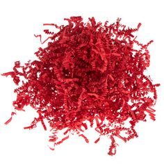 a pile of red shredded paper on a white background