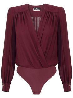 bordeaux red fully draped wrap design long sleeves embroidered logo buttoned cuffs classic bottoms Elegant Burgundy Blouse For Work, Chic Long Sleeve Burgundy Blouse, Chic Burgundy Long Sleeve Blouse, Elegant Fall Bodysuit For Workwear, Elegant Red Long Sleeve Bodysuit, Chic Long Sleeve Formal Bodysuit, Chic Long Sleeve Bodysuit For Formal Occasions, Elegant Solid Color Bodysuit For Fall, Chic Fitted Burgundy Blouse