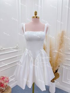 ✔️Style: Short wedding dress. ✔️ Sleeve style: Sleeveless. ✔️ Back: Open back. ✔️ Decoration: Bow. ✔️ Material: satin fabric. ✔️ Length: Above the knee. - All wedding dresses are made to order with a delivery time of 4 to 8 weeks and shipping of 5 to 7 days. - The material used is high quality fabric, does not stretch after washing. - Our store accepts dress designs upon request. You can send images of any wedding dress models you like so we can quote the price and completion time. -Before shipp White A-line Gown For Debutante Ball, Elegant A-line Wedding Dress For Debutante Ball, White A-line Corset Dress For Prom, Satin A-line Evening Dress For Wedding, A-line Satin Evening Dress For Wedding, Sleeveless Gown For Wedding And Prom Season, A-line Bridesmaid Dress For Wedding And Prom Season, Sleeveless Bridesmaid Dress For Wedding, A-line Wedding Dress With Fitted Bodice For Debutante Ball