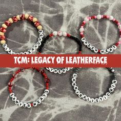 four bracelets with the words'tm legacy of leatherface'written on them