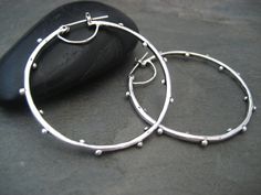 This item is made to order please allow 5 to 8 business days for your order to ship. Here you have a great alternative to the classic hoop, they are very versatile and can easily be worn from day into night. These hoops were hand carved in wax and cast in .925 solid sterling silver, finished with my signature process and light oxidizing, to give them an organic feel. Any imperfections are left intentionally, as it is a characteristic of my jewelry. They measure a little less than 1 3/4 inches in Earrings Circle, Earrings Round, Sterling Silver Hoop Earrings, Sterling Silver Hoops, Circle Earrings, Jewelry Earrings Hoops, Round Earrings, Silver Hoops, Silver Hoop Earrings