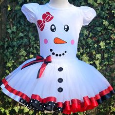 Stay toasty and look oh-so-cute in our Snowman Girl Costume/Tutu Set! Crafted with 100% cotton and premium tulle, this eye-catching outfit will bring a flurry of joy to your little one's winter adventures. Featuring an adorable snowman design with a carrot nose and coal eyes, plus a dazzling tutu skirt that will make winter festivities even more twirl-worthy – it's the must-have ensemble for snow days, holiday parties, and festive photoshoots! Embrace the frosty magic of winter! Ready to snowbal Costume Tutu, Snowman Design, Snow Much Fun, Snow Days, Tutu Costumes, Winter Adventure, Cute Snowman, Tutu Skirt, Girl Costumes