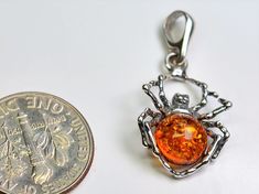 Natural Baltic Cognac Amber with Inclusions 925 Sterling Silver Spider Pendant, 14X24mm. You will receive one Pendant. Made in Poland. Arrives to your home in a Beautiful Box with the "All About Amber" Brochure which includes care instructions! Thank you for looking! Enjoy! Collectible Orange Sterling Silver Jewelry, Spider Pendant, Baltic Amber, Powerful Women, Cognac, Poland, Amber, Care Instructions, 925 Sterling Silver