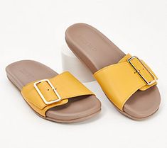 Head out to the farmer's market, take a stroll through the shopping district, or settle in for brunch in these comfy, subtly stylish slide sandals. They're a great go-to option for your daily casual doings. From Naot. Summer Flat Heel Flip Flops With Buckle Closure, Chic Summer Slide Slippers, Chic Slide Slippers For Vacation, Modern Beach Slides With Buckle Closure, Modern Flat Footbed Sandals For Spring, Modern Slides With Buckle Closure For Beach, Modern Adjustable Slide Sandals, Modern Slip-on Sandals For Summer, Summer Leather Footbed Slip-on Slides