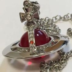 Vivienne Westwood Small Orb Necklace. Stone Color: Red. Aesthetic Vivienne Westwood, Westwood Jewellery, Vivienne Westwood Necklace, Westwood Necklace, Orb Necklace, Vivienne Westwood Jewellery, Lizzie Hearts, Grunge Jewelry, Red And Silver