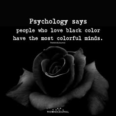 a black and white photo with a rose in the center that says, psychology says people who love black color have the most colorful minds