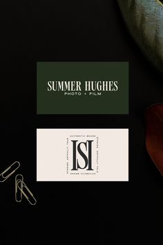 the logo for summer heights photo and film is displayed on a table with scissors, paper clips, and other items