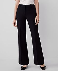 Elevate your wardrobe with the timeless elegance of Ann Taylor's The Jayne Trouser Pant. This piece is meticulously designed to enhance your silhouette, featuring a classic, slightly flared leg that gracefully lengthens your legs. Perfect for professional settings or sophisticated social gatherings, these trousers are a versatile addition to any fashion-forward woman's collection.

- Size: 8 (Regular fit)
- Color: Classic Black
- Material: 74% Polyester, 21% Rayon, 5% Spandex
- Gender: Female
- Classic Flare Workwear Bottoms, Fitted Black Wide Leg Pants With Welt Pockets, Classic Flare Pants With Pockets, Elegant Flared Bottoms With Pockets, Elegant Black Straight Bottoms, Black Straight Bottoms For Workwear, Flare Bottoms With Pockets For Workwear, Fitted Flare Pants With Pockets, Black Straight Bottoms For Work