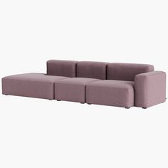 a purple couch sitting on top of a white floor