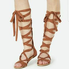 Cognac Gladiator Sandals Brown Flat Lace-up Sandals For Spring, Beach Suede Lace-up Sandals With Round Toe, Suede Lace-up Sandals For Beach With Round Toe, Brown Lace-up Sandals For Vacation In Spring, Brown Lace-up Sandals For Spring Vacation, Brown Suede Lace-up Beach Sandals, Brown Suede Lace-up Sandals For Beach, Beach Sandals With Cushioned Footbed And Lace-up, Casual Suede Lace-up Beach Sandals