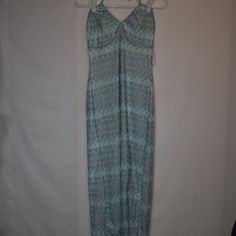 Brand: Wild Fable Style: Long Ankle Length Dress Color: Patterned Blue And White Size: Medium Material: Recycled Polyester Condition: New With Tags Absolutely Stunning Dress With An Open Back. Ankle Length With A Halter Top Light Blue Stretch Beach Dress, Fitted Light Blue Maxi Dress For Vacation, Light Blue Fitted Maxi Dress For Beach, Fitted Light Blue Maxi Dress For Beach, Light Blue Fitted Maxi Dress For Day Out, Fitted Light Blue Maxi Dress For Day Out, Blue Stretch Maxi Dress For Beach, Blue Stretch Sundress Maxi Dress, Blue Stretch Maxi Dress For Day Out