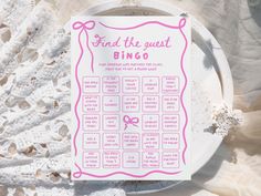 a pink and white wedding game on a plate