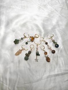 4 or 8 Mushroom Hippie Hair Charms: Set with the intention of unity and communication. Clips open and shut to make applying easy!  Crystals: Clear Quartz, Agate, Jasper, Tigers Eye, Citrine, Pearls, and Czech Beads. 🫧Every order comes with a goodie bag full of an assortment of hippie items!🫧 Mushroom Hippie Hair Charms are made using Sterling Silver Wire/Gold Plated Wire each piece is made with ethnically sourced crystals<3 Each are handmade and not alike. They have the same color scheme and m Hippie Hair Accessories, Crystal Hair Jewelry, Hippie Accessories, Mushroom Hair, Hair Charms, Jewelry Hippie, Hippie Aesthetic, Charms Earrings, Car Charms Mirror