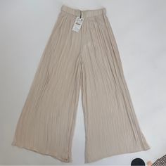 Condition: Excellent, New With Tags Size: S Color: Ivory / Champagne #Palazzo #Pleated #Trousers #Pants #Zara Off White Wide Leg Pants For Spring, Elegant Cream Bottoms For Day Out, Beige Non-stretch Bottoms For Day Out, Cream High-waisted Pants For Spring, Trendy Beige Wide Leg Pants For Spring, Spring Cream High-waisted Pants, Cream Wide-leg Pants For Day Out, Chic Beige Wide Leg Pants For Day Out, Cream Straight Pants For Spring