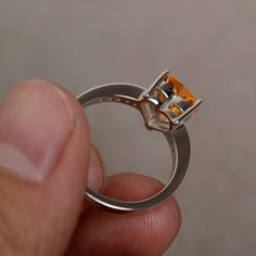 This is a gorgeous handmade creation. Its beauty is its simplicity & Elegance. The 8 mm heart cut faceted natural citrine is crafted in solid sterling silver and with rhodium plated. All item is sent in a beautiful gift box You can realize more lovely stuff clicking the link https://www.etsy.com/shop/knightjewelry?refshopsection_shophome_leftnav Please leave the correct address and you phone number for delivering successfully. Silver Citrine Birthstone Ring With Accent Stones, Orange Sterling Silver Promise Ring Jewelry, Citrine Topaz Promise Ring, Silver Citrine Crystal Promise Ring, Elegant Silver Citrine Birthstone Ring, Silver Citrine Birthstone Ring For Anniversary, Amber Topaz Sterling Silver Promise Ring, Amber Topaz Ring In Sterling Silver For Promise, Silver Citrine Birthstone Ring Fine Jewelry