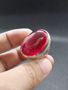 Very Stylish Anari Yaqoot Ring, Red Ruby Ring, Gemstone Ring, Handmade 925k Sterling Silver Ring for Men. -Online Shopping Store -Men & Women Jewelry -Gems & Jewelry Buyers -Jewelry Type        Men Sterling  Silver Handmade Stone Ring -Gemstone Used       Wedding Ring, Birth Stone Ring, Gift Ring, Lucky Ring. -Gemstone Size                   All Sizes Available -Ring Material        Sterling Silver -Ring Type                 Statement Ring, Single Stone Ring  -Size                 Adjustable US Size Offered as on Order -Delivery Carrier                 FedEx    -Delivery Period          7 Business Days -Payment Method            PayPal Traditional Oval Ruby Ring, Traditional Oval Ruby Ring As Gift, Traditional Red Ruby Ring For Anniversary, Spiritual Ruby Rings In Red, Traditional Red Ruby Anniversary Ring, Traditional Red Ruby Ring, Spiritual Red Ruby Rings, Spiritual Red Ruby Ring In Sterling Silver, Traditional Red Ruby Ring For Gift