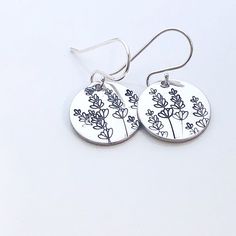 "Lavender Earrings - Silver Disk Earrings, Spring or Summer Earrings, Cute Earrings Gift For Her, Wildflower Earrings, Floral Earrings 5/8\" pewter or sterling silver discs are stamped with beautiful lavender flowers. They hang from sterling silver ear wires. The earrings measure about 1\" from the top of the earwire to the bottom of the disc. Choose your disc metal from the drop down box (earwires are always sterling silver!)" Silver Round Hoop Earrings For Mother's Day, Nickel-free Earrings For Mother's Day, Mother's Day Nickel Free Dangle Flower Earrings, Delicate Sterling Silver Earrings For Mother's Day, Nickel-free Sterling Silver Earrings For Mother's Day, Mother's Day Nickel-free Dangle Flower Earrings, Sterling Silver Earrings With Ear Wire For Mother's Day, Dangle Flower Earrings With Ear Wire For Mother's Day, Handmade Silver Botanical Earrings