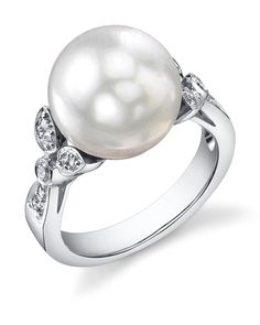 This gorgeous 18K white gold pearl ring is mounted with a beautiful 12mm AAA quality white south sea pearl with 'Very High' luster (please see our pearl grading section for more information). This beautiful pearl ring includes .25 carats of SI-quality diamonds and is made of 5.77 grams of the highest quality 14K gold. All pearl rings are approved by our staff of GIA pearl experts and come packaged in a beautiful pearl jewelry box. Please view the options below to customize your pearl ring to you White Gold Pearl Ring, Pearl Rings Vintage, Pretty Engagement Rings, Casual Rings, Pearl Rings, Gold Pearl Ring, Rings Vintage, Sea Pearl, White Jewelry