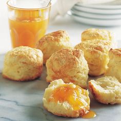 biscuits and orange juice on a table