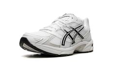 The ASICS Gel-1130 “Black/White” is another standout colorway of the retro performance running shoe.  The ASICS Gel-1130 was first released in 2008 and is now one of the most popular sneakers in the Y2K trend in sneaker culture.  On this colorway, the upper features a white mesh construction with tonal and light grey leather overlays.  ASICS’s classic tiger stripes are designed in white and accented in black  on either side of the shoe.  “ASICS” and “Gel-1130” branding are seen on the mesh tongu Asics 1130, Jordan Golf, Nike X Travis Scott, Sneaker Culture, Jordans Women, Shoes Outfit Fashion, Popular Sneakers, Jordan 2, Shoes Outfit