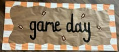 a paper bag with the word game day on it