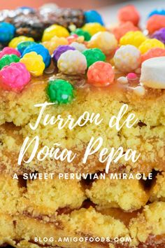 a close up of a piece of cake with candy on top and the words turro de dona pepa above it