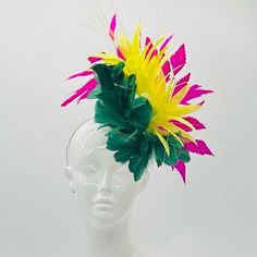 Handmade by Featured Milliner of The Kentucky Derby Museum 2023 & 2024! Green, yellow and pink Kentucky Derby Fascinator. Generous feathery for a bold statement.  Attaches with headband.  Not taking customs this year--Derby 150 is going to be massive and mom life keeps me running! However, happy to suggest pieces that will coordinate with your outfit. If you don't love the way this attaches to your head--message me!  I can swtich *most* pieces to your preference. Clip, Headband OR Elastic Cord Head Message, 2024 Green, Clip Headband, Kentucky Derby Fascinator, Derby Fascinator, Head Wear, Kentucky Derby Hat, Derby Hat, Yellow And Pink