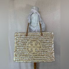 Brand New! Price Is Firm. Tory Burch Raffia Ella Large Tote In Natural Raffia Body With Leather Trim. Open Top Leather And Chain Strap With 9.2" Drop Single Compartment With Removable Zippered Pouch Height: 17.3"; Length: 13.5"; Depth: 7.2" Style Number 88084 Comes With A Dust Bag. Tory Burch Ella Tote, Ella Tote, Tory Burch Ella, Color Block Tote, Tory Burch Tote, Tory Burch Bag Totes, Weekender Tote Bag, Zippered Pouch, Crochet Tote