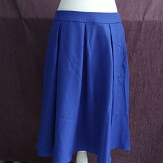 Brand New With Tags, Classic Blue Skirt With Pockets. Fully Lined And Has Nice Lines. Measures Approximately 25" Waist To Hem. Blue A-line Bottoms With Pockets, Casual Blue A-line Skirt, Blue Skirted Bottoms With Solid Color, Blue Skirted Bottoms Solid Color, Blue Midi Skirt With Pockets, Blue Casual Pleated Skirt With Pockets, Blue Summer Skirt With Side Pockets, Blue Solid Color Skirt, Casual Blue Pleated Skirt With Pockets