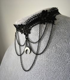 Black lace gothic choker featuring a black chains design and a crescent moon pendant in the middle. Lace is 3cm in the widest part. Updated lace and with stainless steel closure. This piece fastens with a clasp and 5cm chain at the back. It is to fit neck sizes from 12 to 14.7 inches (31-36cm). If these measurements do not fit you, send me your measurements with your order. This choker is light and not heavy on the neck. I offer FREE product customization. Therefore customized products or choker Chains Design, Black Lace Choker Necklace, Moon Choker, Collar For Women, Gothic Choker, Black Lace Choker, Lace Choker Necklace, Choker Black, Gothic Chokers