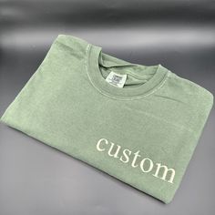 Custom Embroidered Comfort Colors T Shirt, Custom Embroidery Shirt, Embroidered Tee, Custom Text Tee, Fathers Day Gifts, Comfort Colors Tee  ** If you want to add text line; https://www.etsy.com/listing/1729447484/additional-text-embroidery-extra-line?ref=listings_manager_grid ** If you want to add on sleeve;   https://www.etsy.com/listing/1718295061/custom-sleeve-extra-sleeve-add-on?ref=listings_manager_grid **If you do not include the font , we will pick it for you.  **If not left thread color Text Embroidery, Text Tshirt, Tshirt Custom, Embroidery Shirt, Text Tee, Let It Shine, Quote Shirt, Embroidered Tee, Shirt Embroidery