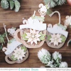 a close up of a coffee cup with flowers on it