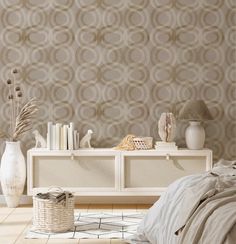 a bedroom scene with focus on the bed and wall papered in circles patterning