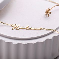 Sideway Signature Necklace | Off-Center Handwriting Necklace | Birthday Gift | Gift for Mom | Mother's Day Gift | Cursive Name Necklace ♦ Material: Solid 925 Sterling Silver ♦ Finish: Sterling Silver, Rose Gold, Plated Gold ♦ All items are made to order according to your personalization choices. ♦ Turn around time may vary depending on the season.  HOW TO ORDER: ♦ Please choose the color and  Write the name and font number you prefer ( Emma - Font 2) Signature Nameplate Necklace As Gift, Signature Nameplate Necklace For Gift, Minimalist Customized Name Necklace For Birthday, Minimalist Custom Name Necklace For Birthday, Minimalist Name Necklace For Mother's Day Birthday, Minimalist Name Necklace For Birthday Gift, Minimalist Engraved Name Necklace For Birthday, Minimalist Name Necklace For Birthday And Mother's Day, Minimalist Nameplate Necklace For Birthday