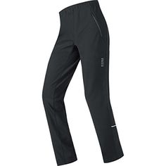 the women's running pants are black with white writing on the side and zippers