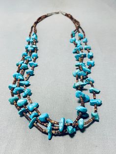 "MAKE US AN OFFER BY CLICKING THE \"MESSAGE SELLER\" Button- Up for sale is this marvelous vintage Navajo necklace having 3 strands of Kingman turquoise chunks with dark brown heishi in between, handcarved silver cones and a handmade silver hook and eye clasp! Stunningly Beautiful! The largest turquoise chunk measures about 5/8\" x 3/8\". Sterling silver. The length of the necklace measures around 26\". Sturdy 61 grams. Cir Mid Century+ Make Us an Offer- Due to the high demand of our items, many Vintage Turquoise Necklace Hand-strung, Vintage Hand-strung Turquoise Necklace, Vintage Beaded Necklaces With Natural Turquoise Stones, Vintage Blue Turquoise Necklace Collectible, Collectible Vintage Blue Turquoise Necklace, Handmade Rustic Turquoise Necklace, Handmade Rustic Blue Turquoise Necklace, Rustic Handmade Blue Turquoise Necklace, Vintage Adjustable Turquoise Beaded Necklace