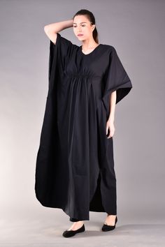 "Very romantic caftan dress in black. The main advantages of this long black dress are the kimono sleeves and the loose fit cut which hides any flaws while the gathered detail under the bust emphasizes the top part of the body. This black maxi dress is very comfortable so it is a great choice for the daytime matched with flats. ^ Sizes: The item can be made in sizes from XXS to 7XL. Please, use the size chart below or if you are not sure about your size, just * contact us with your measures! ^ E Black Oversized Long Abaya, Oversized Black Long Abaya, Long Black Abaya For Spring, Black Long Abaya For Spring, Elegant Black Batwing Sleeve Dress, Long Black Spring Abaya, Spring Black Long Abaya, Black Batwing Sleeve Evening Dress, Black Evening Dress With Batwing Sleeves