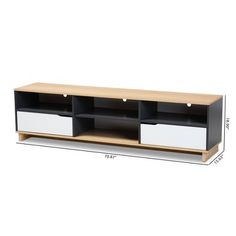 a black and white entertainment center with drawers