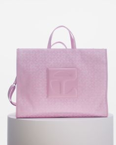 Large Jacquard Shopper - Bubblegum Monogram – shop.telfar Telfar Bags, Shopper Bag, Bubblegum Pink, Long Weekend, Embossed Logo, Small Bag, Bubble Gum, Drawstring Bag, Dust Bag