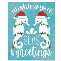 two seahorses wearing christmas hats with the words wishing you seas and greetings