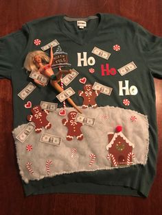 an ugly sweater has been made to look like a barbie doll with gingerbreads on it