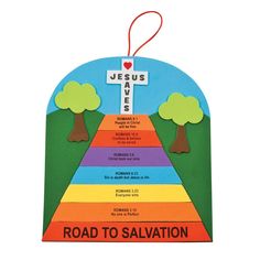 the road to salvation ornament is hanging on a white background with trees and rainbows