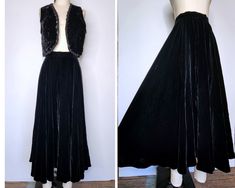 Vintage Black Velvet Skirt  High Waist  Maxi - Ankle Floor Length  Zip on back  Not Lined  Lots of beautiful fabric  Guessing circa 50s but could be more recent like 70s/80s  NOTE : if you are interested in the velvet cropped vest shown in pictures, here's the link as it's sold separately: https://www.etsy.com/listing/1681004364/vintage-black-velvet-vest-cropped-by?click_key=5a5faadc94df2120e1efc428da8b81b194141da5%3A1681004364&click_sum=0e749821&ref=shop_home_active_2&frs=1&sts=1 Excellent Vint Vintage Black Skirt For Costume Party, Vintage Fitted Evening Skirt, Fitted Vintage Costume Bottoms, Vintage Fitted Bottoms For Costume, Vintage Party Lined Skirt, Vintage Full-length Fitted Skirt, Vintage Fitted Full-length Skirt, Vintage Formal Full Skirt Bottoms, Vintage Stretch Party Skirt