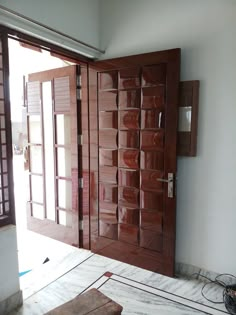 a room that is being remodeled with wooden doors