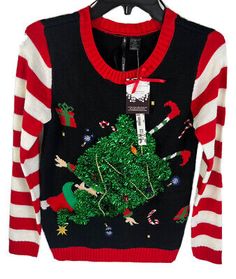 So It Is S Juniors Christmas Sweater Clumsy Elf blk red white green $39 | eBay Holiday Party Sweater, Ugly Sweater Diy, Tinsel Tree, Party Sweaters, Ugly Sweater Party, Christmas Sewing, Jewelry Outfit, Christmas Fashion, Ugly Sweater