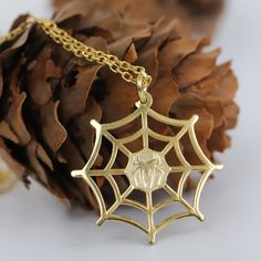 This Gold Spider Web necklace is a perfect Halloween gift for Kids, Women and Men. "WHY YOU'LL CHOOSE US  PERSONALIZED DISK LETTER NECKLACE Our handmade jewelry that i make with my love and it has a cute and shining look. It has beautiful design that will excite you and those around you. And I am using very high quality material so you can use it yourself or gift to your mothers, girlfrends and daughters. I guarantee that you will be loved after using my handmade jewelry. ITEM DETAILS * %100 HANDMADE ITEM * Material: 925 Sterling Silver * Color: Gold, Silver * Style: Minimalist  * Spider WEb Size HXW : 20mm X 20mm * Finish: Gold Plated, Silver Plated * Chain Length: 12 inches, 14 inches, 16 inches, 18 inches, 20 inches, 22 inches  HOW TO ORDER  1. Select the options from the dropdown menu Halloween Novelty Necklaces As Gift, White Necklace For Halloween Gift, White Halloween Necklace Gift, Halloween Themed Jewelry Gift, Personalized Themed Jewelry For Halloween, Halloween Themed Personalized Jewelry, Themed Personalized Jewelry For Halloween, Halloween Novelty Personalized Jewelry, Silk Spider