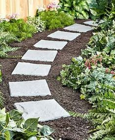 a garden path made out of stones and gravel with the ebay logo on it