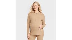 Elevate your cool-weather wardrobe with this hooded maternity nursing sweater from isabel maternity by ingrid & isabel. The long-sleeve ribbed sweater is made of a lightweight shaker fabric in a regular fit for comfortable all-day wear. The zip-off hood offers added coverage, while front half-length zipper closure facilitates nursing or pumping while on the go. Pair with leggings or jeans for easy style during and after pregnancy. | Isabel Maternity by Ingrid & Isabel Hooded Maternity Nursing Tan Sweater (XXL) | Target Nursing Sweater, Nursing Wear, Tan Sweater, Easy Style, After Pregnancy, Maternity Nursing, Ribbed Sweater, Simple Style, Nursing