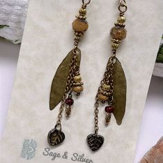 New Autumn Splendor Earrings 3 1/2” Long , Feature Hammered Brass Leaf Shaped Charm. Czech Glass Beads In Warm , Muted Shades Of Honey, Brick Red ,& Black. Raw Brass Chain, 18 Kt Gold Plated Accent Beads & Ear Wires. Perfect For Fall & Gifting Made By Me New , Never Worn 18 Kt Gold Plated Ear Wires Oddities Jewelry, Earthy Earrings, Gold Bead Earrings, Jewelry Making Earrings, Hammered Brass, Tassel Jewelry, Fall Earrings, Making Earrings, Fall Gifts