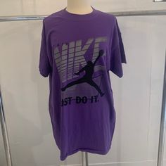 Awesome Vintage 90’s Bootleg Purple Nwot Air Nike Just Do It T-Shirt In Near Perfect Condition. Listed As One Size Fits All On Tag But Is Likely An Xl. Made In Usa! Pit To Pit: 23” Inches Length: 29 1/2” Inches Pop Culture/Rap/Hip Hop/Fashion/Ralph Lauren/Polo/Nike/Supreme/Adidas/Reebok/Vintage/Sports/Gucci/Louisvuitton/Hilfiger/Tommy/80s/90s/Valentino/Majestic/Champion/Jersey/Fila/Voit/Trucker/Snapback/Soccer/Basketball/Football/Baseball/Track/Volleyball/Tennis/Nba/Nfl/Mlb/Ufc/Wwe/Wwf/Wcw World Air Nike, 90s Rap, Rap Tee, Nike Just Do It, Vintage Sports, Ralph Lauren Polo, Hip Hop Fashion, Just Do It, One Size Fits All